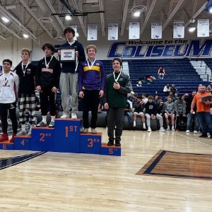 Wrestlers on podium 2